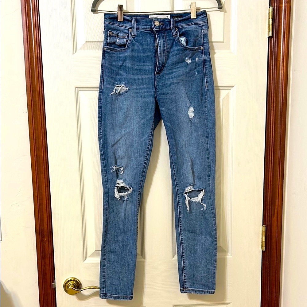 Garage Distressed Blue Jeans.    Excellent Condition